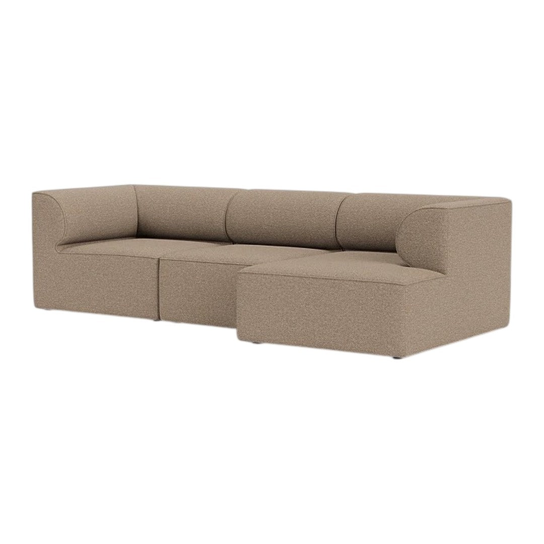Beige sectional sofa with a smooth, textured fabric and minimalist design. Ideal for modern living spaces.