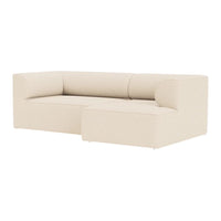 Beige minimalist sofa with a modern, clean design and smooth, upholstered fabric.