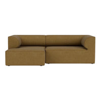 Brown sectional sofa with a modern design and smooth, textured upholstery. Perfect for contemporary living spaces.