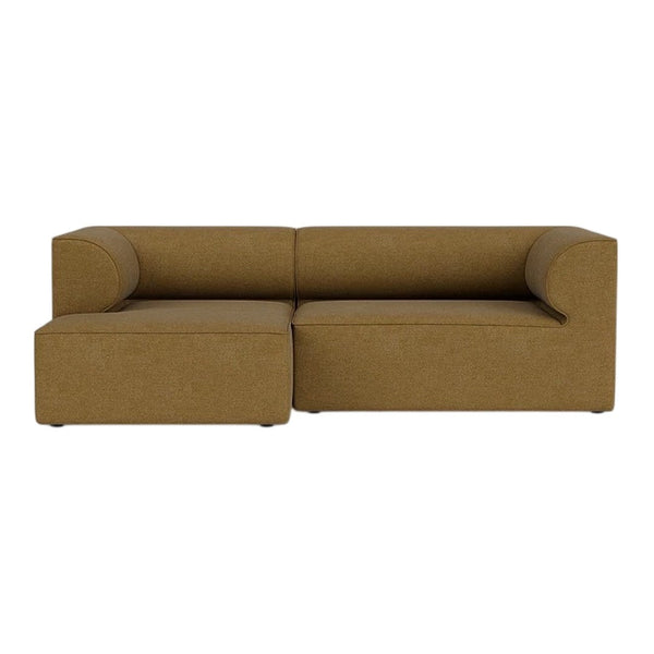 Brown sectional sofa with a modern design and smooth, textured upholstery. Perfect for contemporary living spaces.