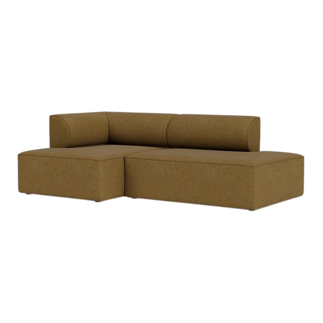 Brown sectional couch with a minimalist design and smooth upholstery, perfect for modern living spaces.