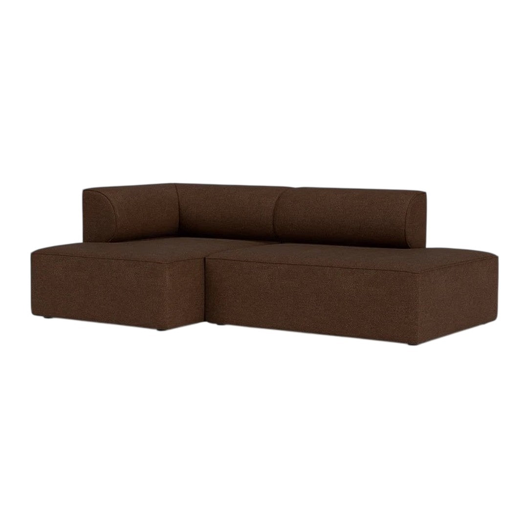Brown sectional sofa with a sleek, modern design and clean lines, perfect for contemporary living spaces.