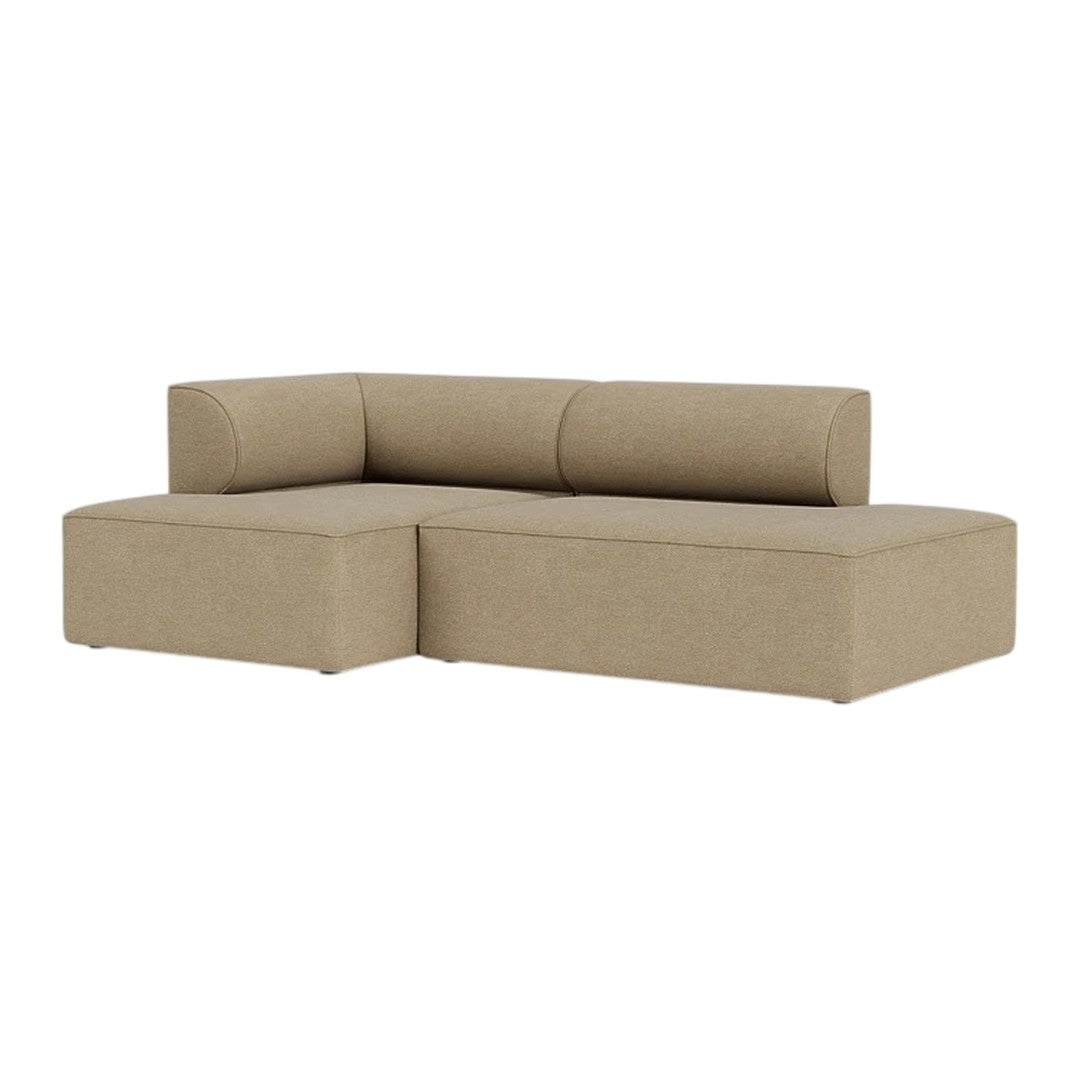 Beige sectional sofa with a smooth fabric finish and simple, modern design. Ideal for contemporary living spaces.