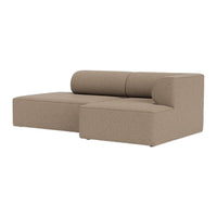 Beige sectional sofa with a smooth, minimalist design and subtle textured fabric. Ideal for modern living spaces.