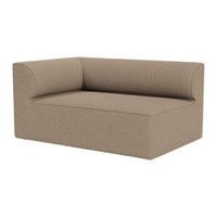 "Olive green curved sofa with a smooth, modern design and plush upholstery, perfect for contemporary spaces."