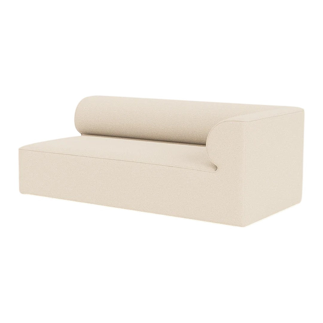 Beige modern sofa with a minimalist design and smooth, clean lines, featuring a rounded back and side.