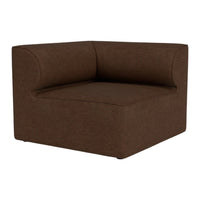 Brown upholstered corner chair with a smooth, minimalist design and soft, textured fabric. Perfect for modern decor.