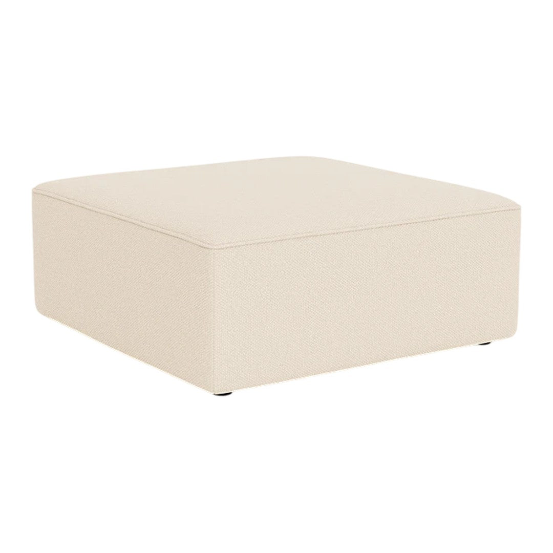 Cream-colored square ottoman with a smooth, minimalist design and no visible patterns.
