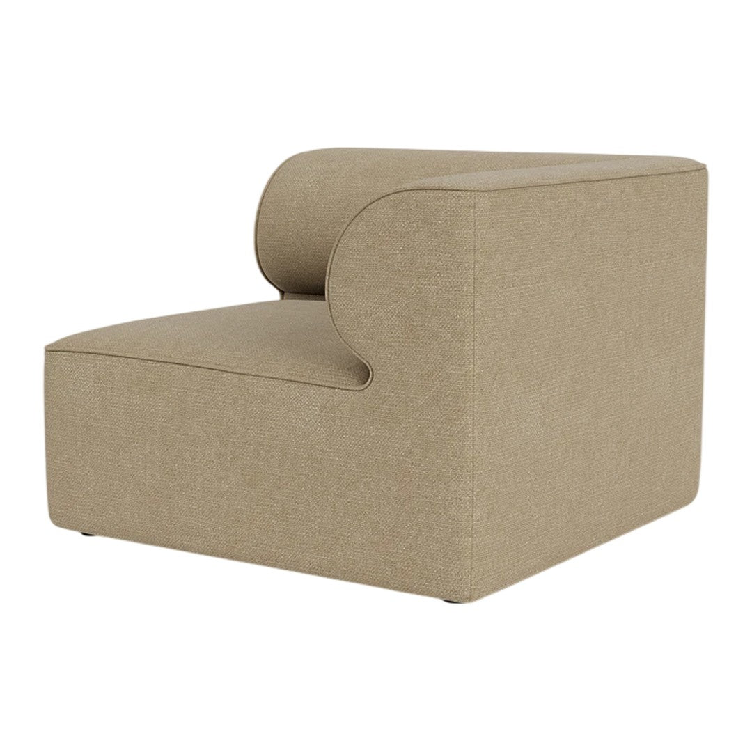 Beige upholstered accent chair with smooth, rounded edges and minimalist design. Ideal for modern interiors.