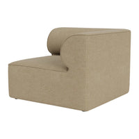 Beige upholstered accent chair with smooth, rounded edges and minimalist design. Ideal for modern interiors.