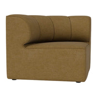 Stylish yellow-brown upholstered corner chair with elegant vertical tufted design. Perfect for modern decor.
