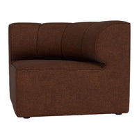 Textured brown accent chair with a curved silhouette and subtle patterned upholstery. Ideal for modern interiors.