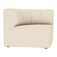 Beige upholstered accent chair with subtle ribbed pattern and smooth contours, perfect for modern decor.