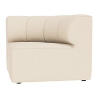 Cream-colored upholstered chair with subtle curved design and horizontal stitching pattern.
