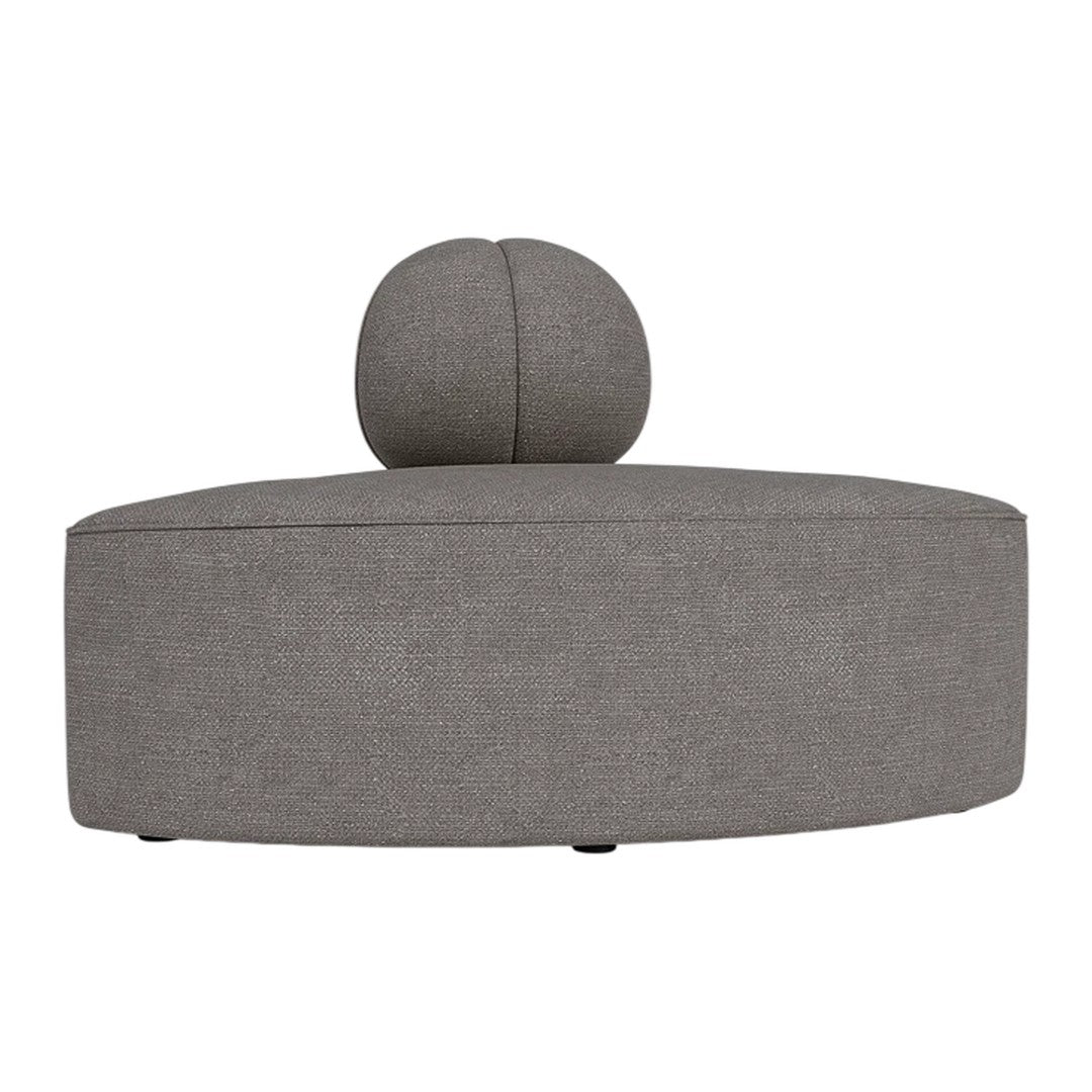 Stylish gray ottoman with a round top cushion, featuring a sleek, modern design and textured fabric surface.