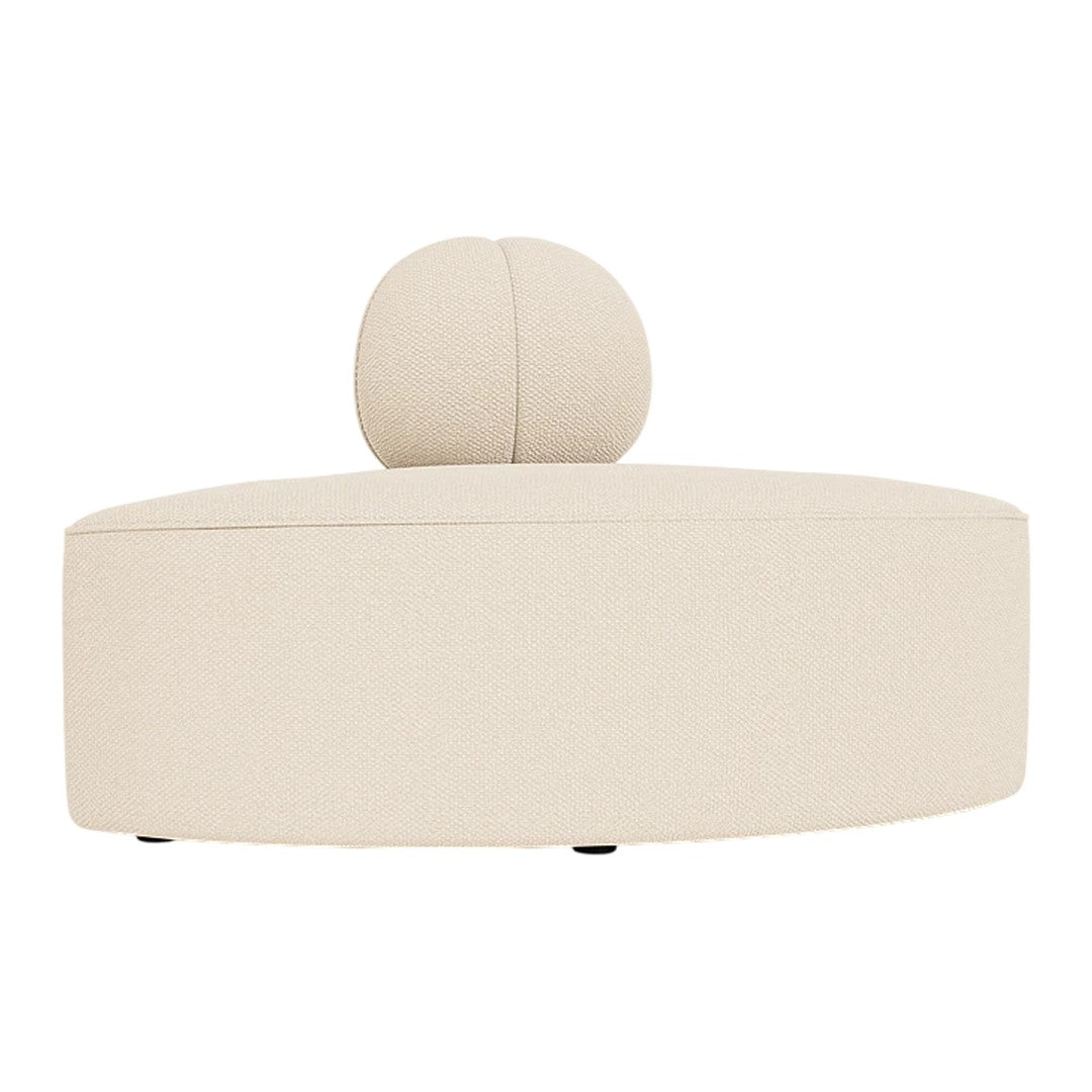 Cream-colored modern ottoman with a round top and a spherical backrest, featuring a smooth texture.