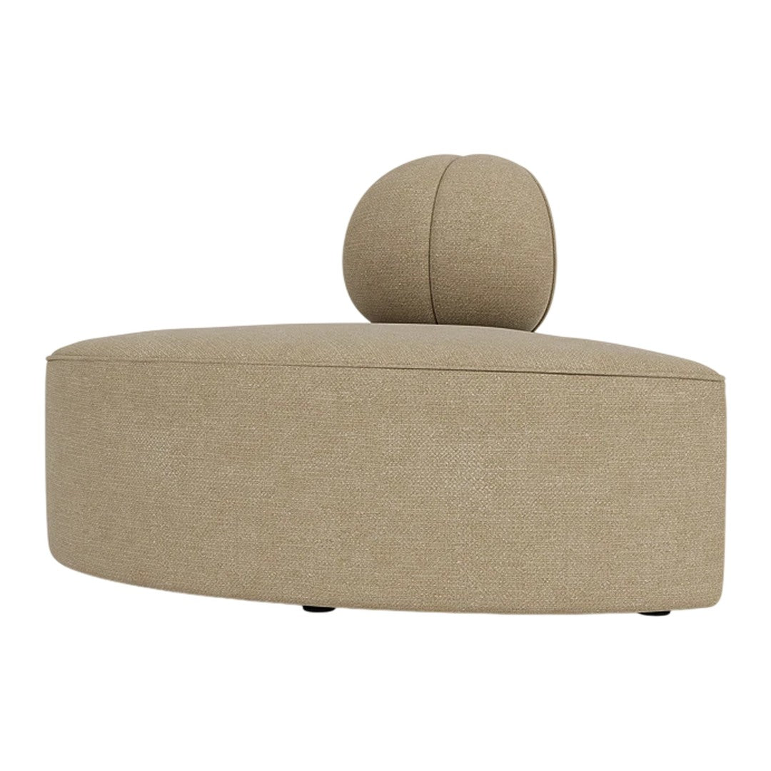Beige rounded ottoman with a spherical accent, featuring a smooth, textured fabric for a modern look.
