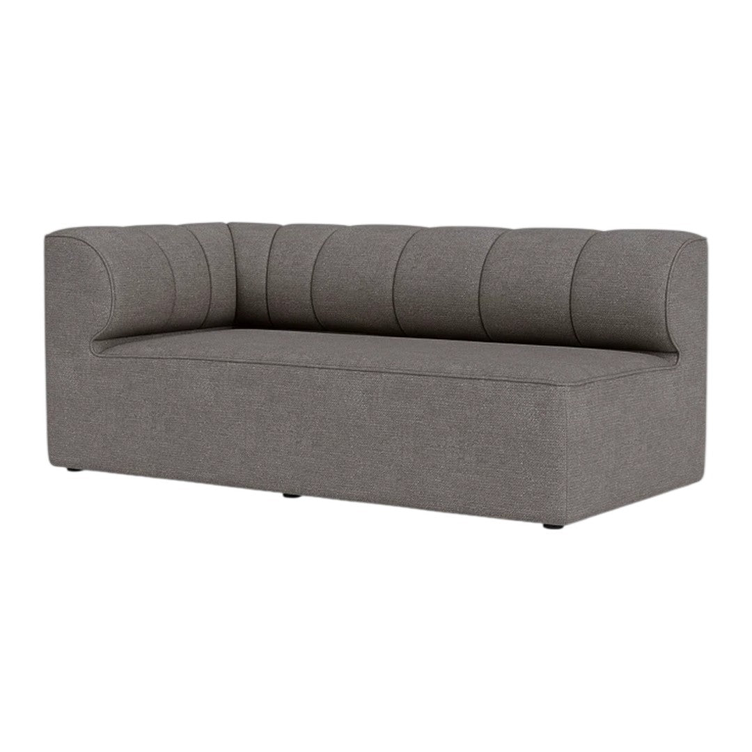 Gray upholstered sofa with a chic channel-stitched design and minimalist rectangular shape. Perfect for modern decor.