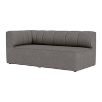 Gray upholstered sofa with a chic channel-stitched design and minimalist rectangular shape. Perfect for modern decor.