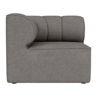 Gray upholstered chair with a smooth, textured fabric and curved design, offering a modern aesthetic.