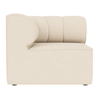 Beige upholstered sectional sofa with a curved arm and minimalist design. Soft texture and modern aesthetic.