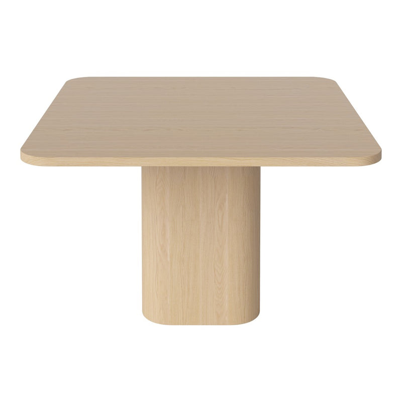 Light beige square table with a smooth, matte finish and a cylindrical pedestal base. Simple, modern design.