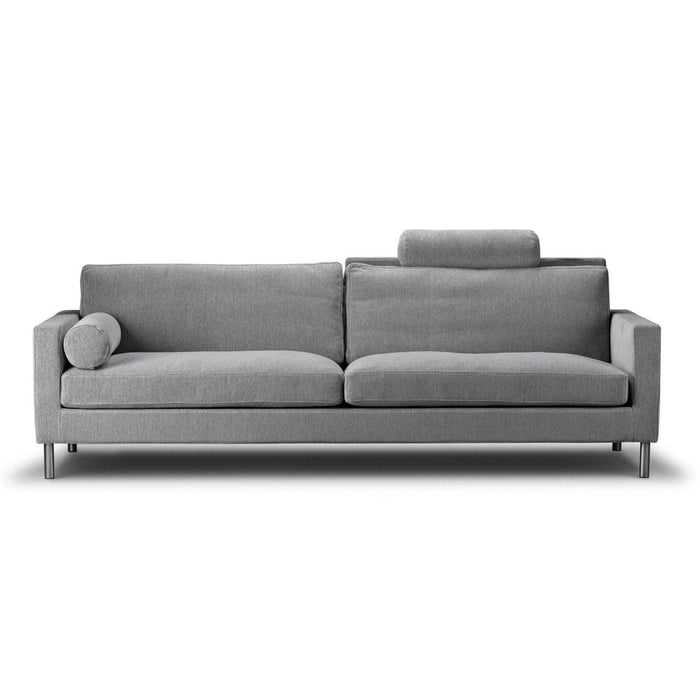 Stylish gray sofa with a minimalist design, featuring a textured fabric and clean lines, perfect for modern decor.