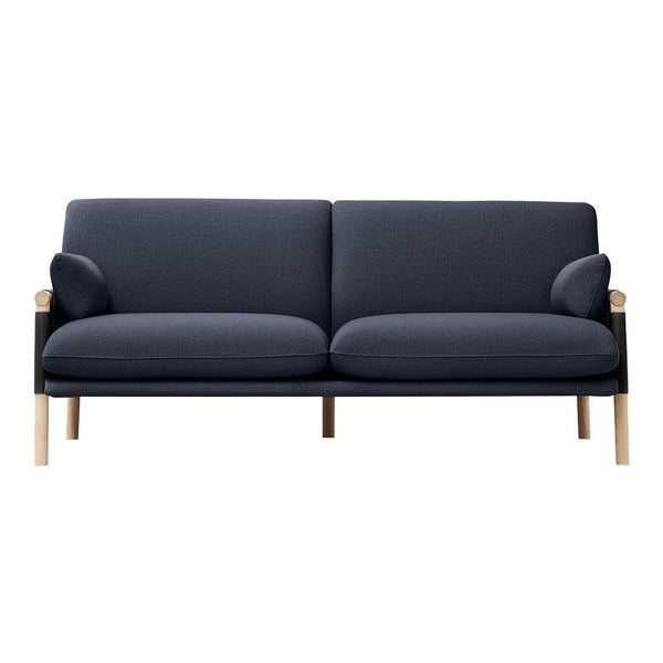 Dark blue two-seater sofa with curved arms and light wooden legs, showcasing a sleek, modern design.