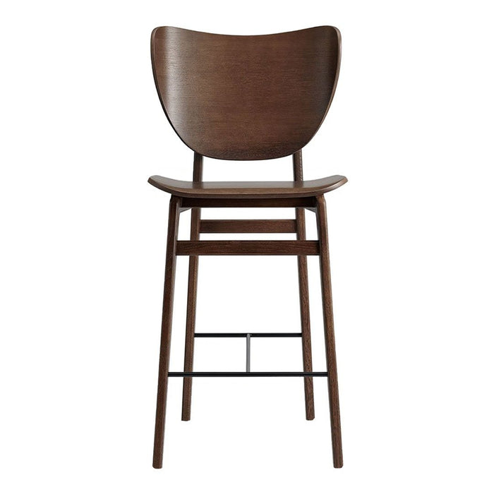 Brown wooden bar stool with a minimalist design and smooth surface, featuring a curved backrest and sleek black legs.