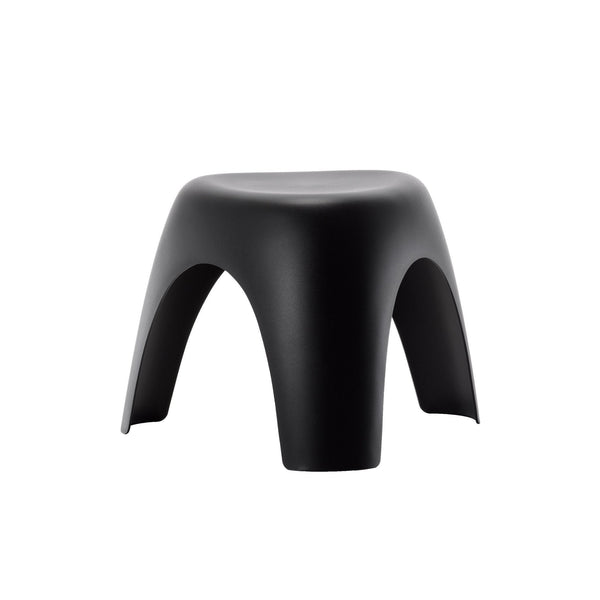 Black minimalist stool with smooth surface and unique arch design, perfect for modern decor.