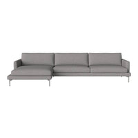 Light gray sectional sofa with clean lines and a minimalist design, featuring plush cushions and sleek metal legs.