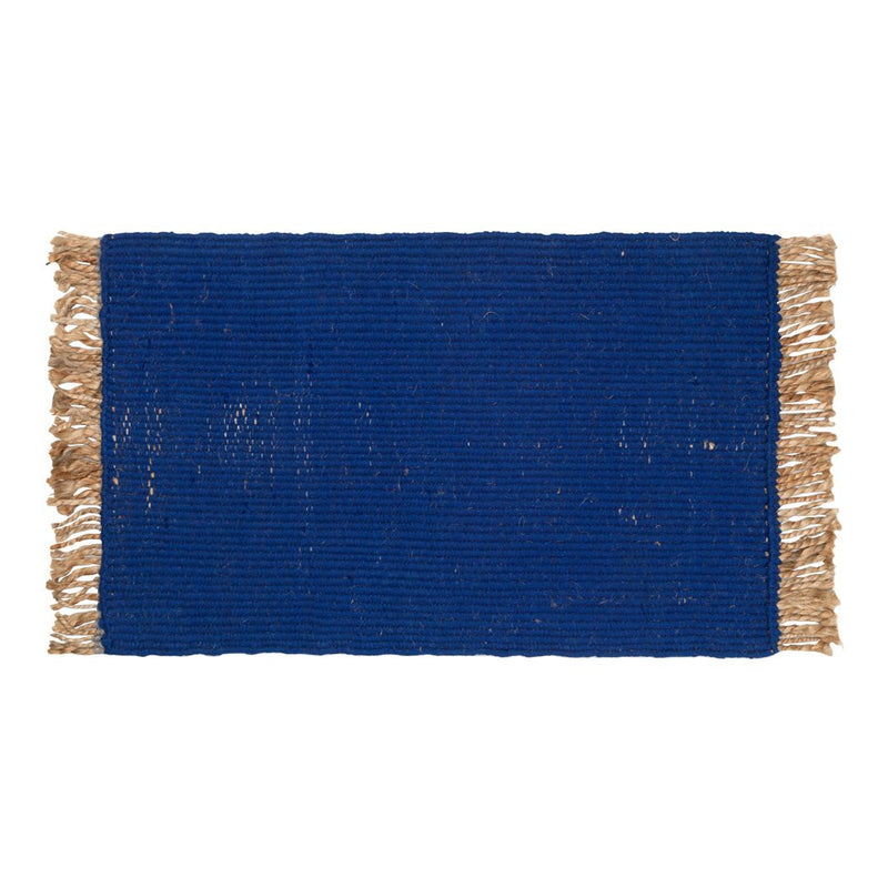 Bold blue rectangular rug with textured weave and tassel fringe. Ideal for adding color and style to any space.