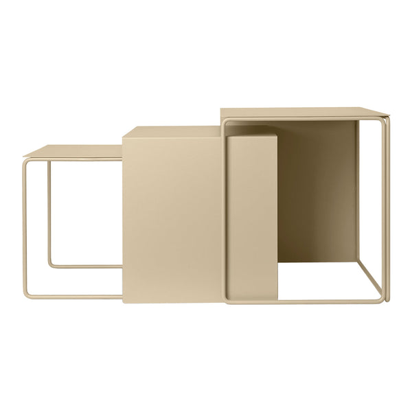 Beige minimalist nesting tables with geometric shapes and clean lines on a white background.