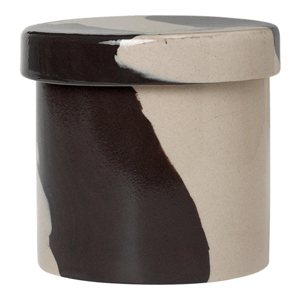 Multicolored ceramic storage jar featuring abstract black, beige, and white patterns and a smooth finish.