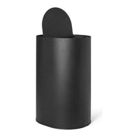 Black cylindrical trash can with a sleek matte finish and a round lid. Minimalist design perfect for modern decor.