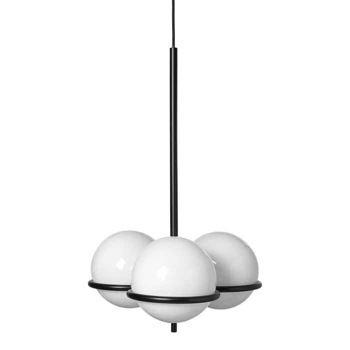 Modern pendant light with three glossy white globes and a sleek black frame, combining elegance and minimalism.