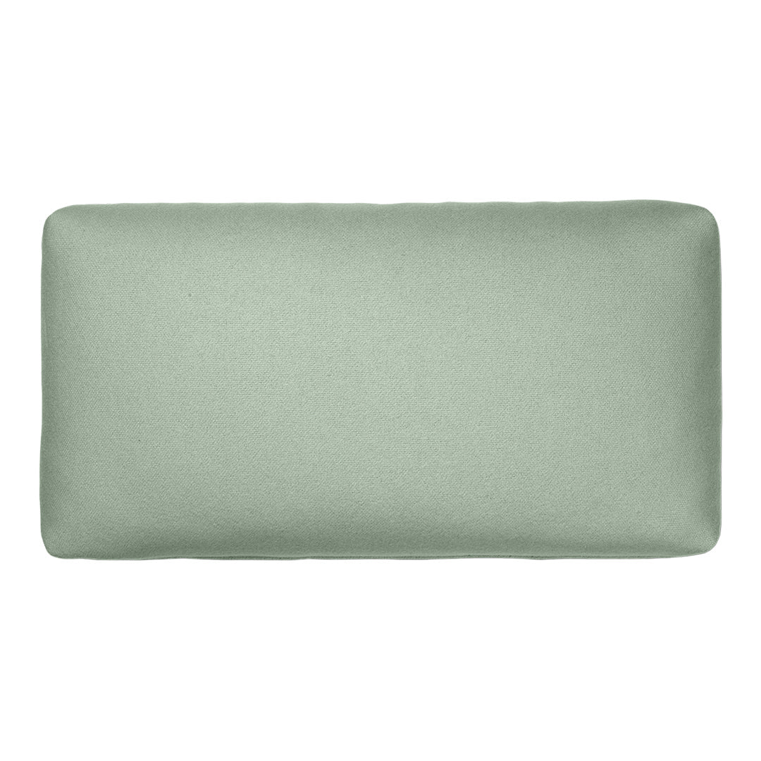 Light sage green rectangular decor pillow with a smooth, solid texture. Ideal for modern and minimalist designs.