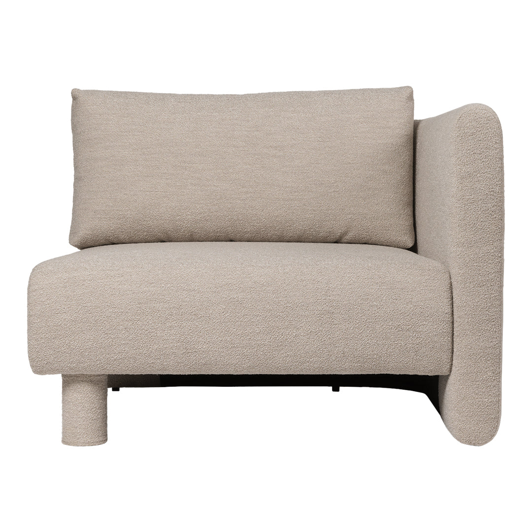Beige modern couch with textured fabric and minimalist design, featuring a unique, rounded backrest.