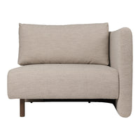 Light beige upholstered accent chair with a smooth texture and minimalist design.