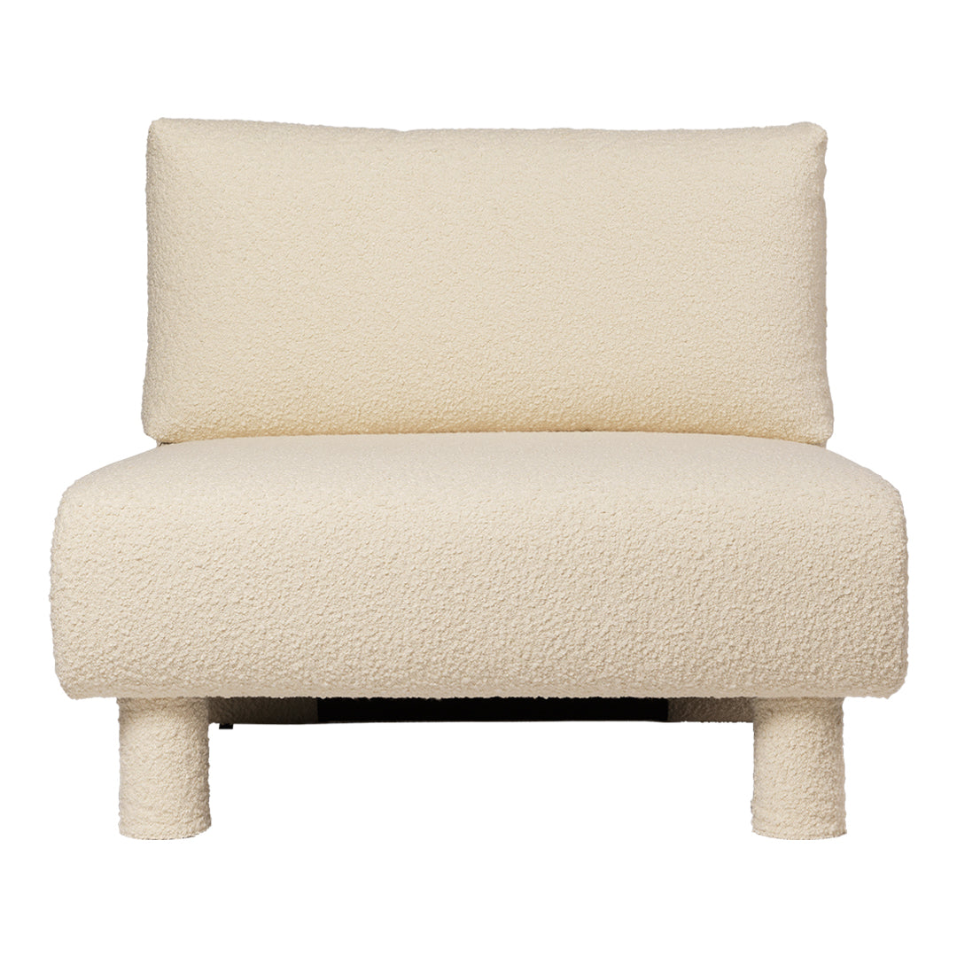 Cream-colored, textured upholstery armchair with a minimalist design and soft, plush surface. Perfect for modern decor.
