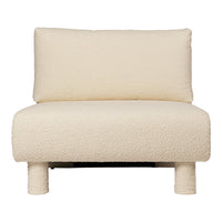 Cream-colored, textured upholstery armchair with a minimalist design and soft, plush surface. Perfect for modern decor.