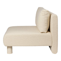 Cream-colored sofa with a minimalistic design and textured fabric. Soft, modern style for contemporary spaces.