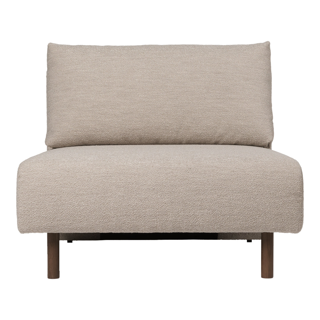 Beige upholstered chair with a smooth texture and minimalist design. Features a solid wood frame for a modern look.