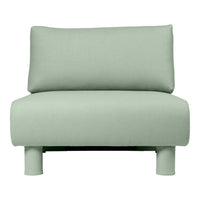 Light green sofa with a smooth, minimalist design and rounded legs, perfect for modern living spaces.