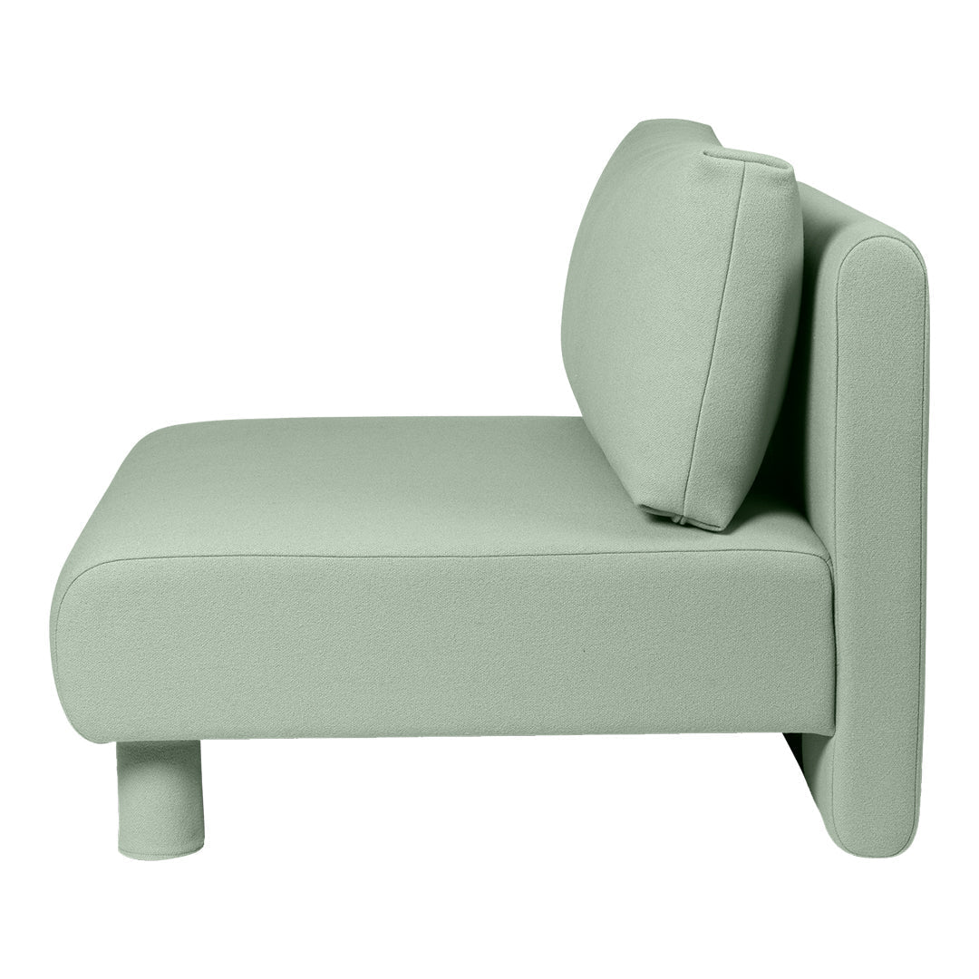 Light green minimalist sofa with smooth, solid upholstery and simple, modern design. Perfect for contemporary spaces.