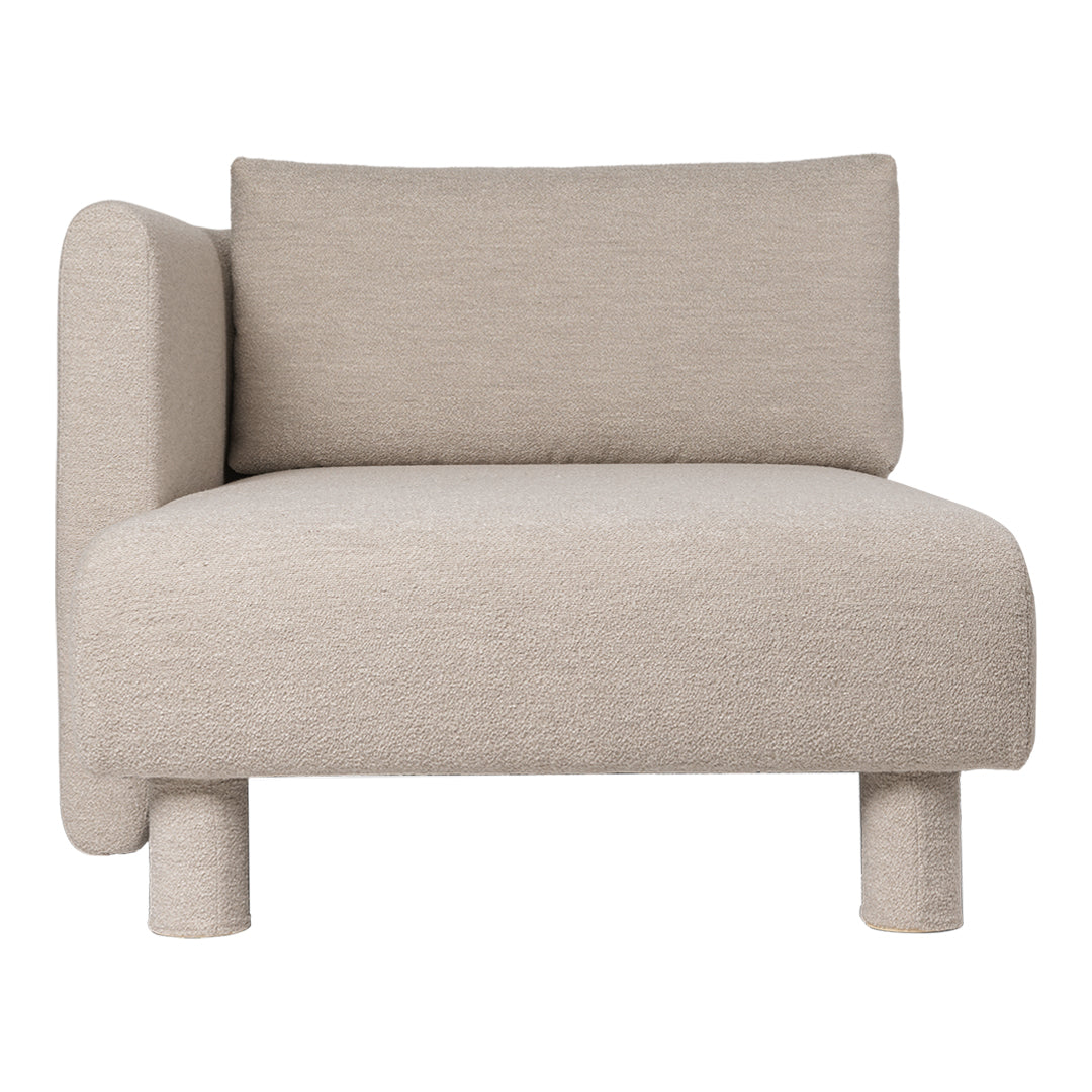 Beige textured chair with a minimalist design, featuring a modern shape and soft fabric upholstery.