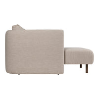 Light beige textured fabric sofa with a smooth, minimalist design and subtle pattern. Ideal for modern decor.