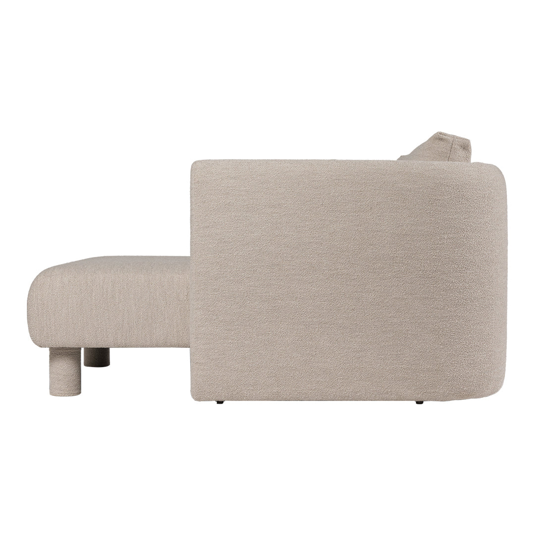 Beige textured sofa with a smooth, minimalist design and rounded edges. Perfect for modern interiors.