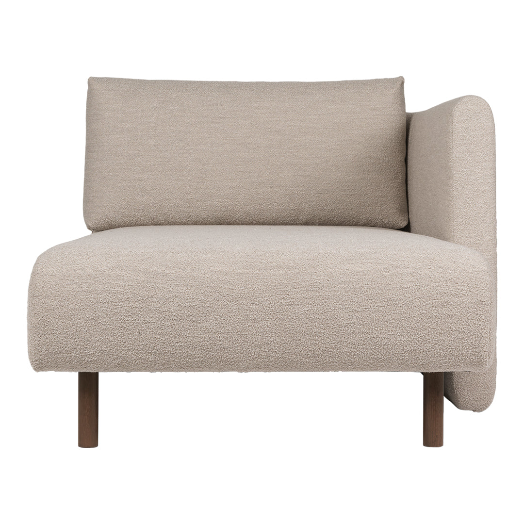Beige textured armchair with a minimalist design and wooden legs, perfect for modern decor.