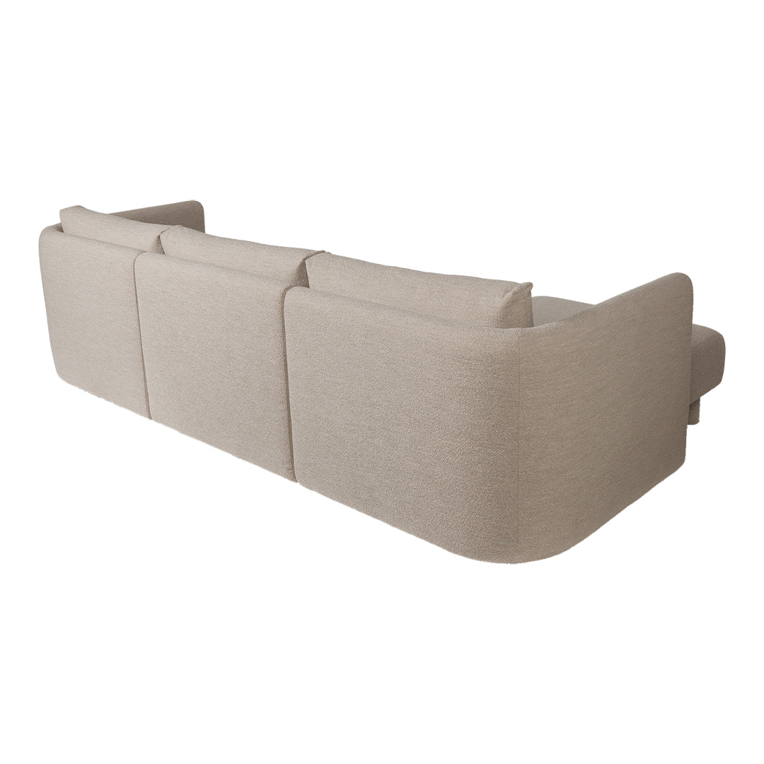 Neutral beige sofa with smooth, minimalist design and subtle texture, perfect for modern living spaces.